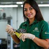 Sonia Patel using eco-friendly cleaning tools