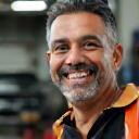 Abdul Rahman smiling after his car was detailed