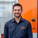 Tom Walters beside his company van